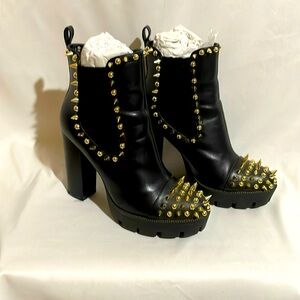 Gold spike boots